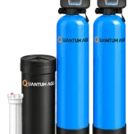 Quantum AGI twin-vessel automatic system: filter and softener vessels with digital control valves, black brine tank and pre-filter housing