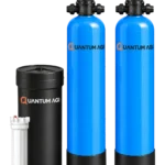 Quantum AGI twin-vessel manual system: filter and softener vessels with manual multiport valves, black brine tank and pre-filter housing